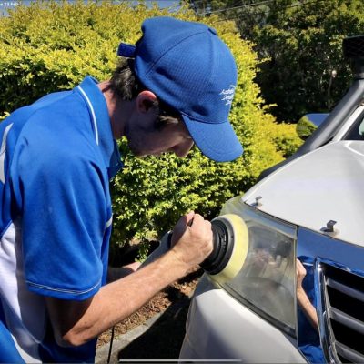 Australia's Detailing Group employee polishing car