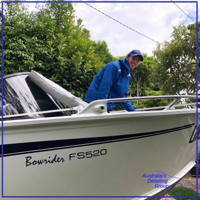 Australia's Detailing Group employee with a boat